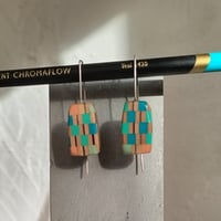 Image of blue random chequered pattern abstract earrings