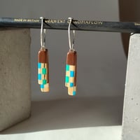Image of chequered pencil silver hoops