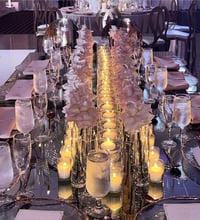 Image 2 of Flower runners with floating candles and two rectangular tables, No luxury chairs included 