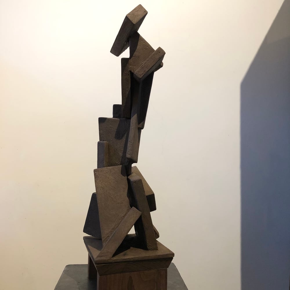 Image of sculpture wood/cement/paint