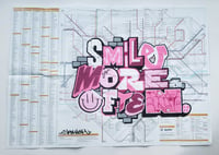 Smile more often by Skyhigh . Original graffiti art on large rail map