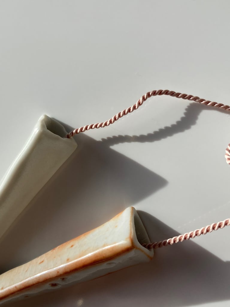 Porcelain necklace, silk chord in petal, white and white shino glazes Image 4