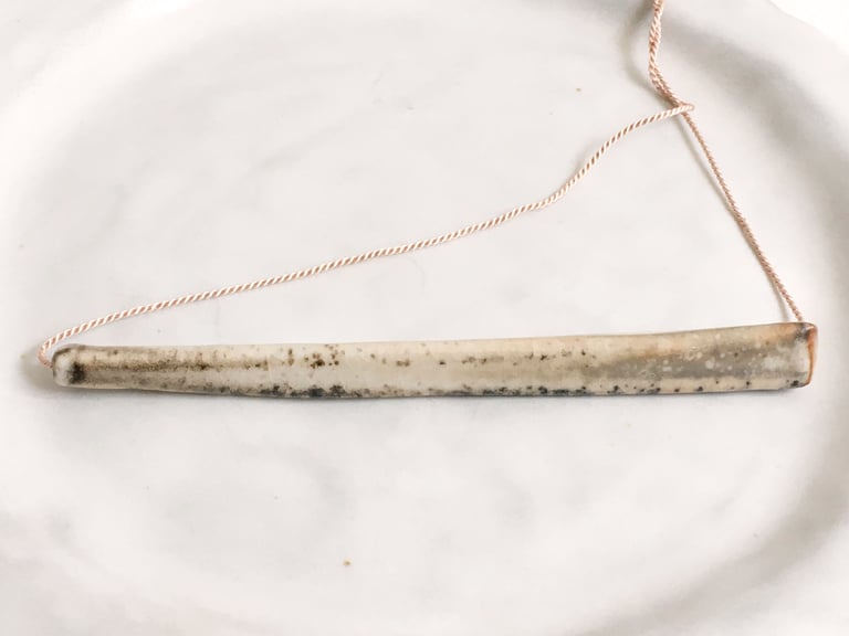 Porcelain necklace, silk chord in petal, bar