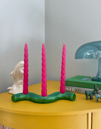 Image 1 of green supreme candlestick holder