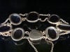 Edwardian 9ct large cabochon garnet bracelet with concealed garnet clasp