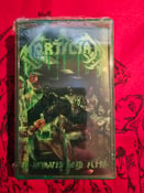 Image of Mortician Reanimated Dead Flesh Cassette Tape Transparent Green Edition