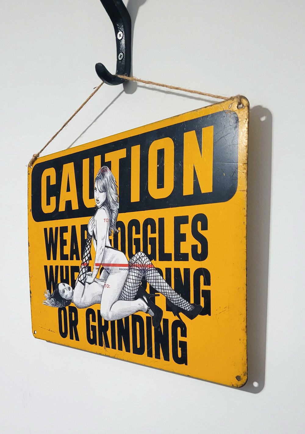 "CAUTION: WEAR GOGGLES WHEN CHIPPING OR GRINDING"