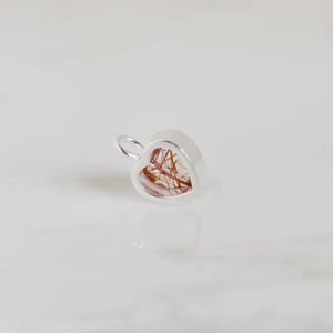 Image of Red Rutilated Quartz heart shape diamond cut silver necklace