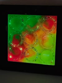 Image 2 of 4.5 in wood panel - tye dye glow resin