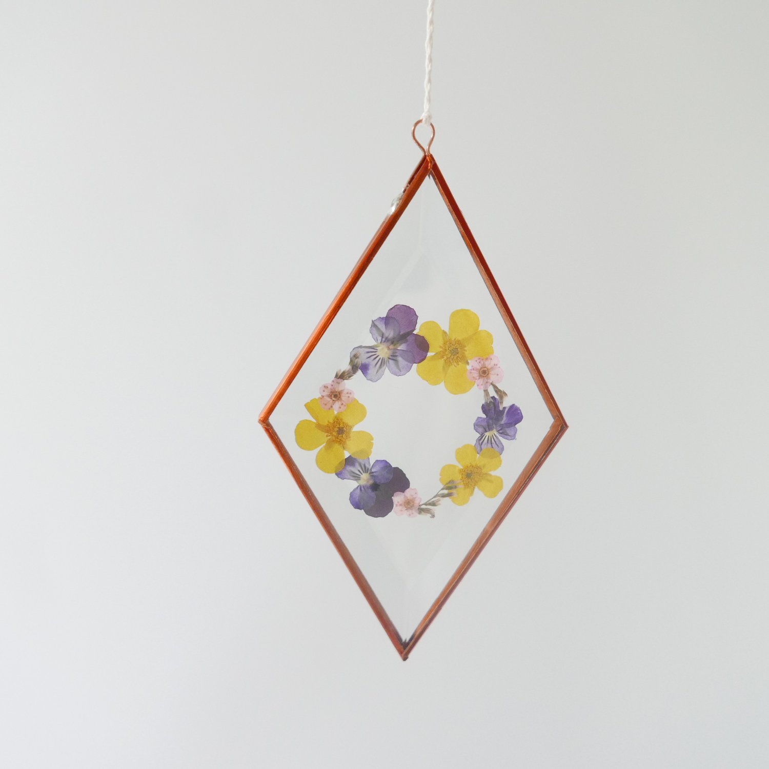 Image of Pressed Flower Suncatcher - Buttercup and Viola Wreath