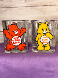 Image 1 of CARE BEAR SHOT GLASS 🧡💛