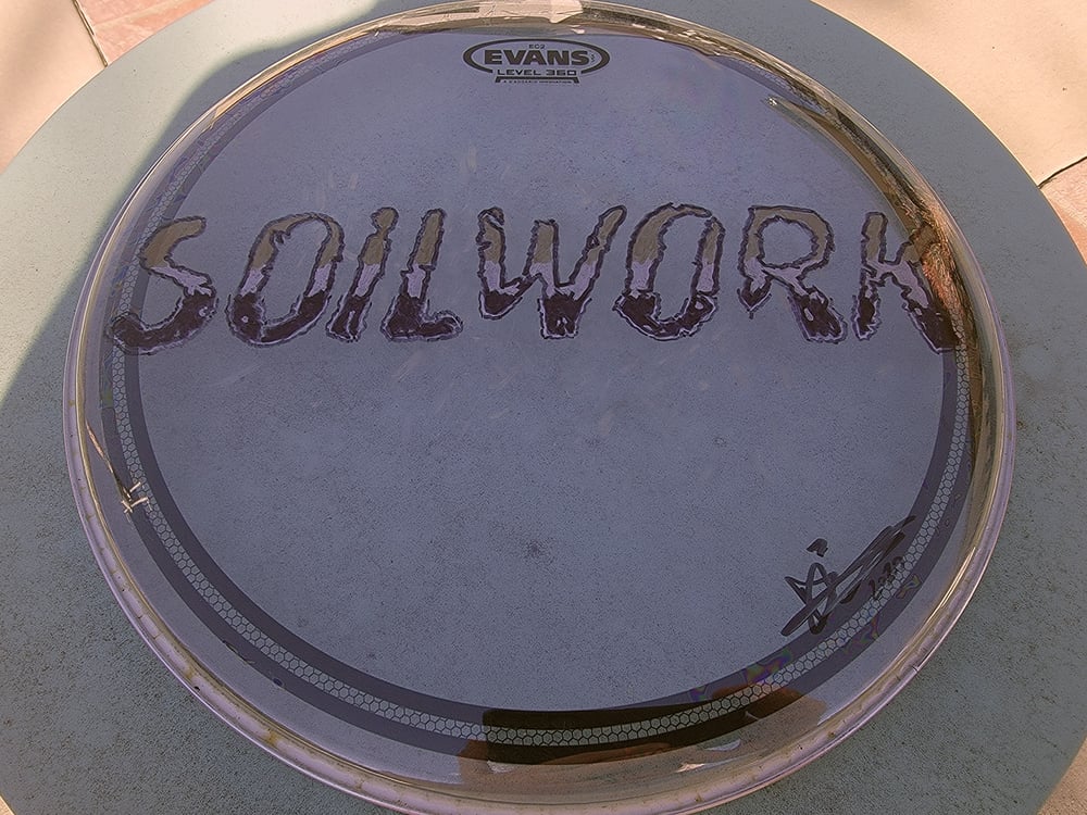 Image of Soilwork Logo Clear Drumhead - illustrated and signed by Dirk