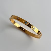 Image 1 of 18K Gold Plated Evil Eye Bangle Bracelet 