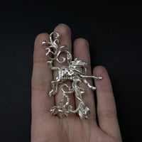 Image 1 of horse flower necklace 