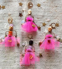 Image 2 of Cranionetta fucsia, lime, lavanda e azzurro polvere 