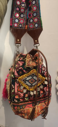 Image 1 of Slouch bag embellished afghan charms pink