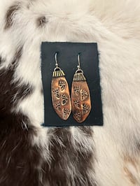 Stamped Copper Paws
