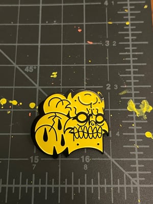 Image of Yellow Enamel skull pin 
