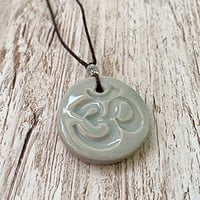 Image 2 of Ice Blue OM Ceramic Pendant/Necklace