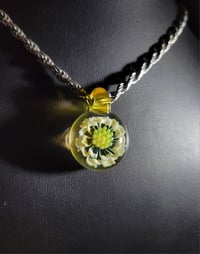 Image 2 of Orange & white flower pendant.