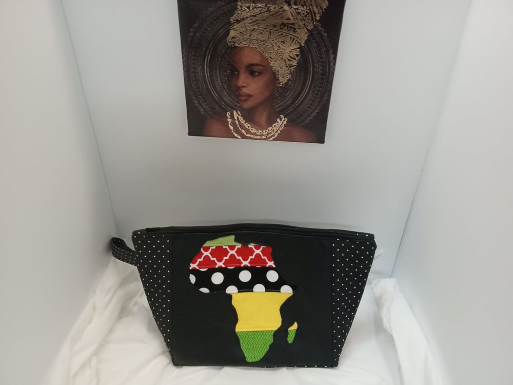 Image of Wristlet Featuring Patch work African Content  