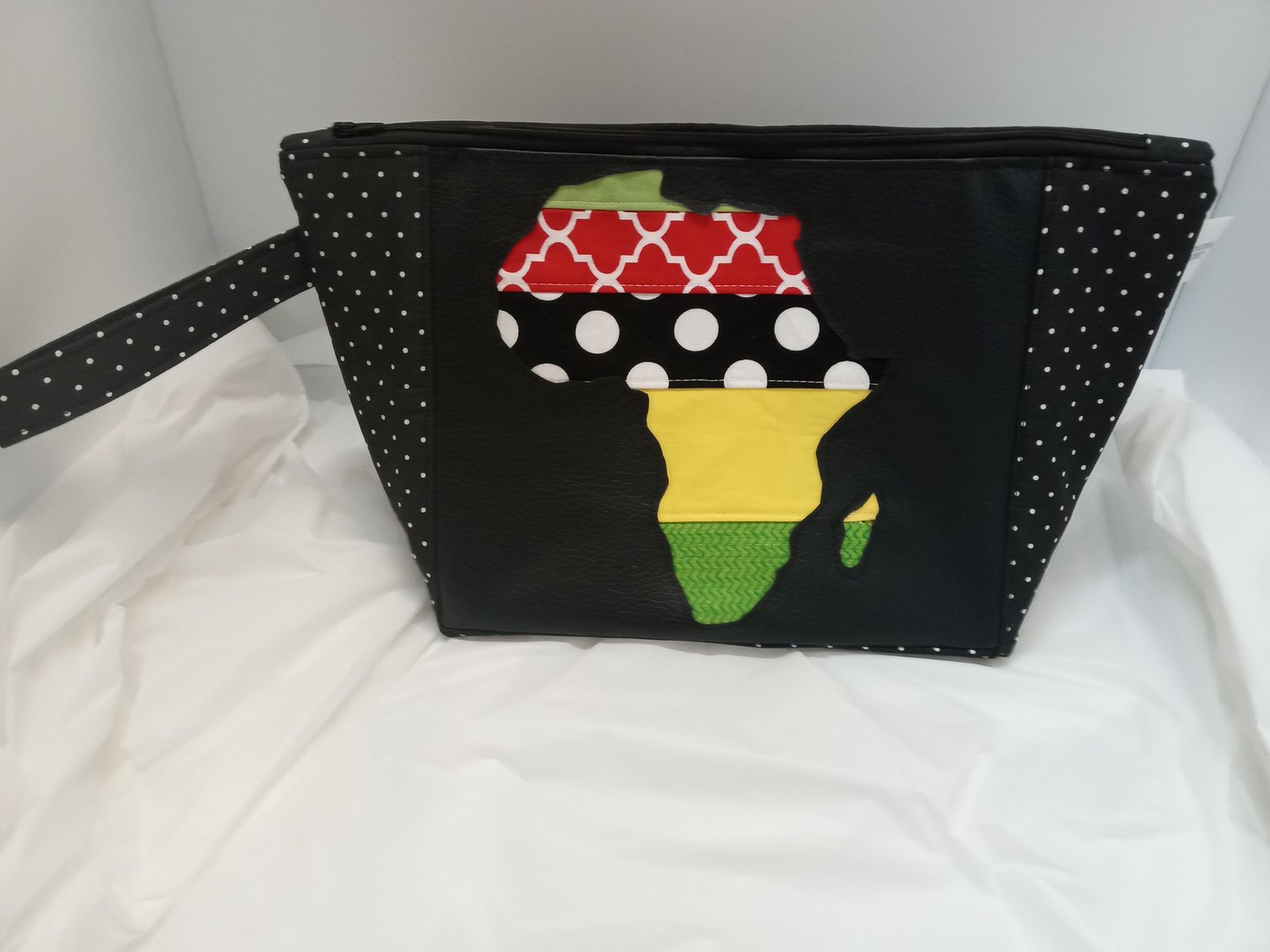 Image of Wristlet Featuring Patch work African Content  