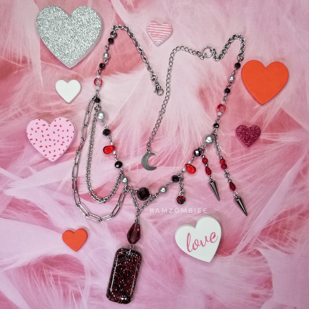 Image of "love bitten" marbled charm necklace