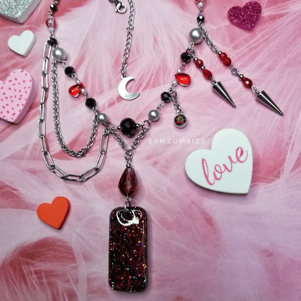 Image of "love bitten" marbled charm necklace