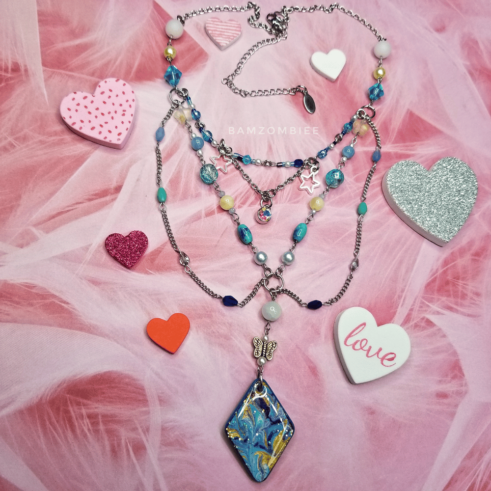 Image of "butterfly kissez" marbled charm necklace