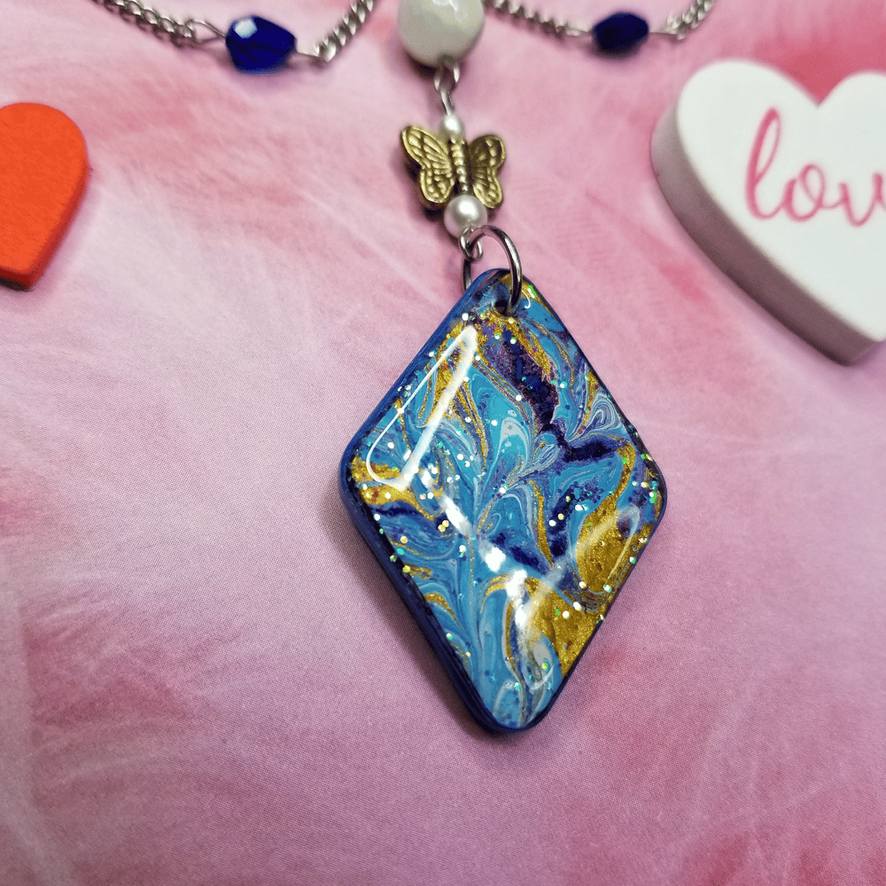 Image of "butterfly kissez" marbled charm necklace