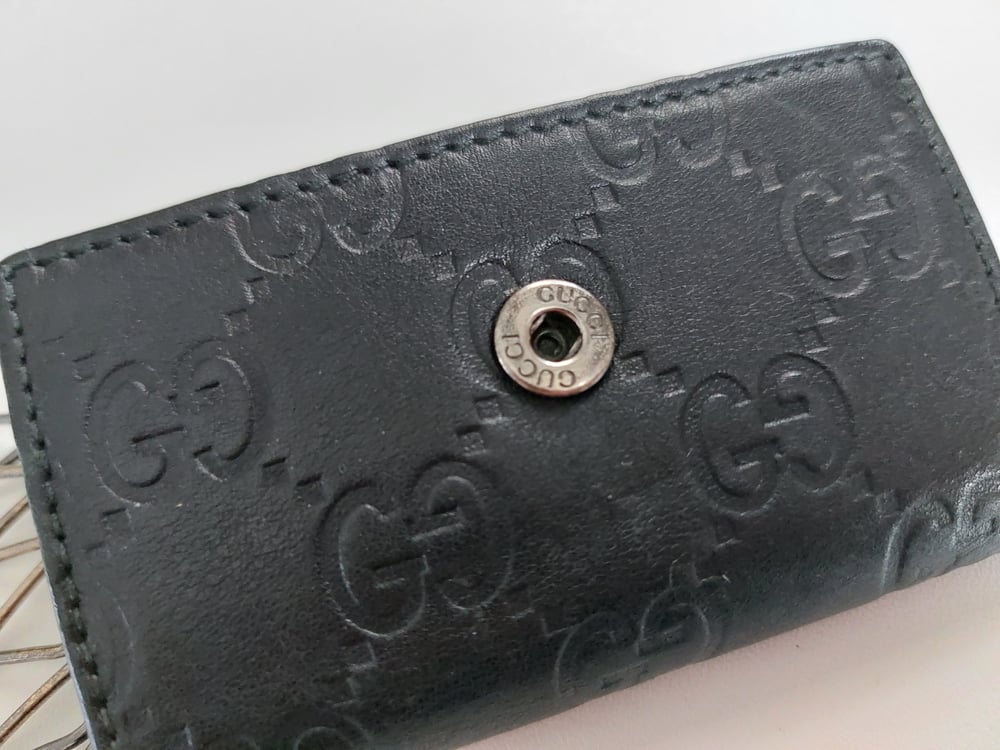 Image of Gucci black leather GG monogram  keychain