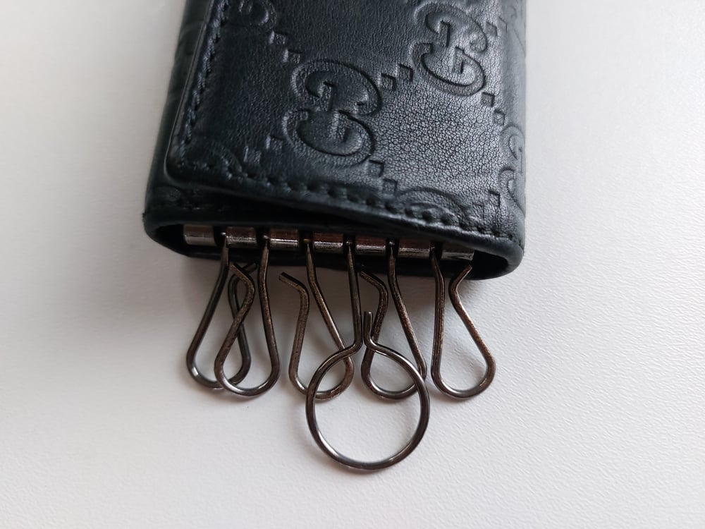 Image of Gucci black leather GG monogram  keychain