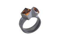Image 3 of Silver Strata ring with a round and square orange citrine, set in oxidized silver.