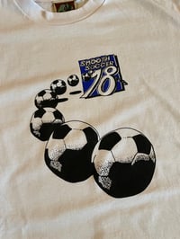 Image of footy tee 