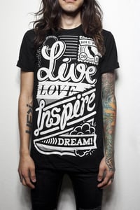 Image of "Live Love Inspire Dream" on black shirt