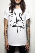 Image of "Signature Tee" on white shirt