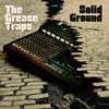 THE GREASE TRAPS SOLID GROUND LP
