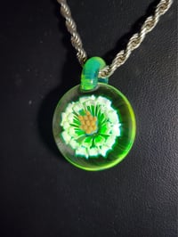 Image 1 of UV reactive daisy pendant. 