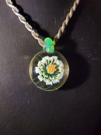 Image 2 of UV reactive daisy pendant. 