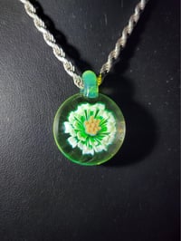 Image 3 of UV reactive daisy pendant. 