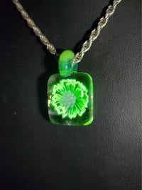 Image 2 of Square UV reactive daisy pendant.