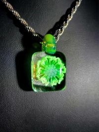 Image 1 of Square UV reactive daisy pendant.