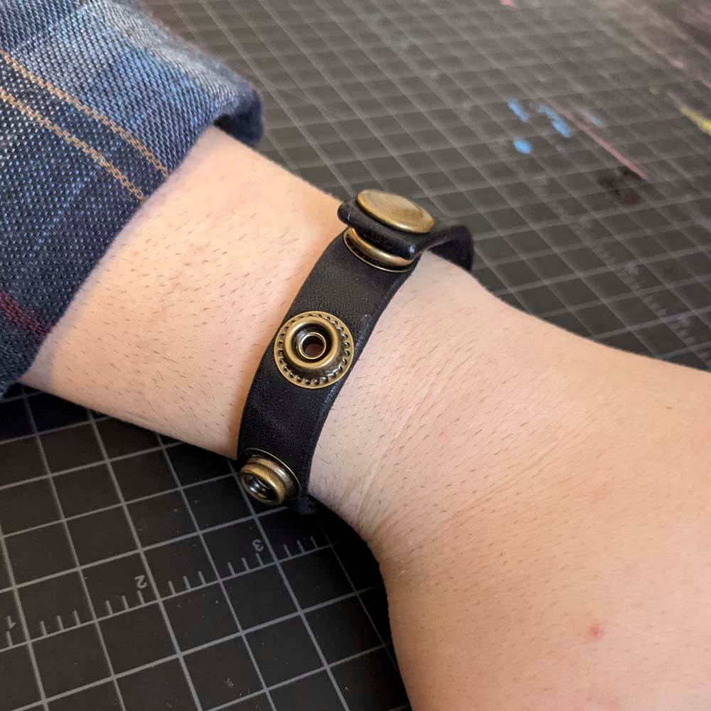 Snap-on leather cock ring