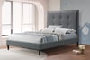 Grey upholstered bed