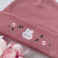 Image 1 of flower bun beanie