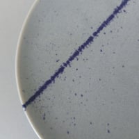 Image 2 of Plate in pale blue with sprayed line decoration 