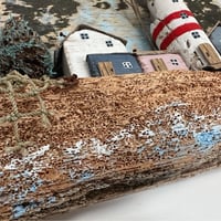 Image 3 of Driftwood. Wall composition made of driftwood drifted in the sea.