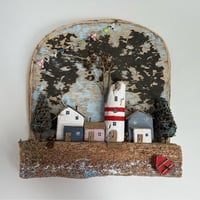 Image 2 of Driftwood. Wall composition made of driftwood drifted in the sea.