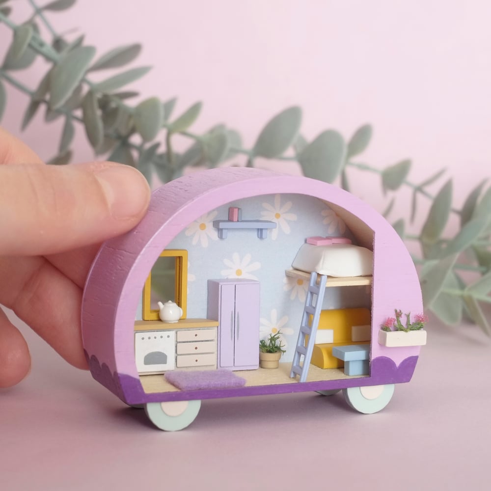 Purple tiny camper