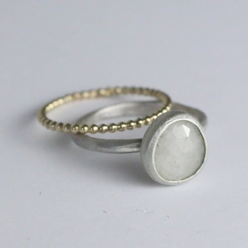 Image of Small pale grey sapphire ring. 